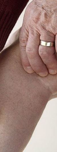 Provider examining a patient for pain or injury